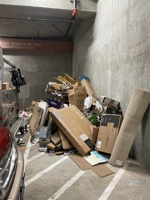 Illegal Dumping in the Garage.  Dumpster Clear Services to the Rescue